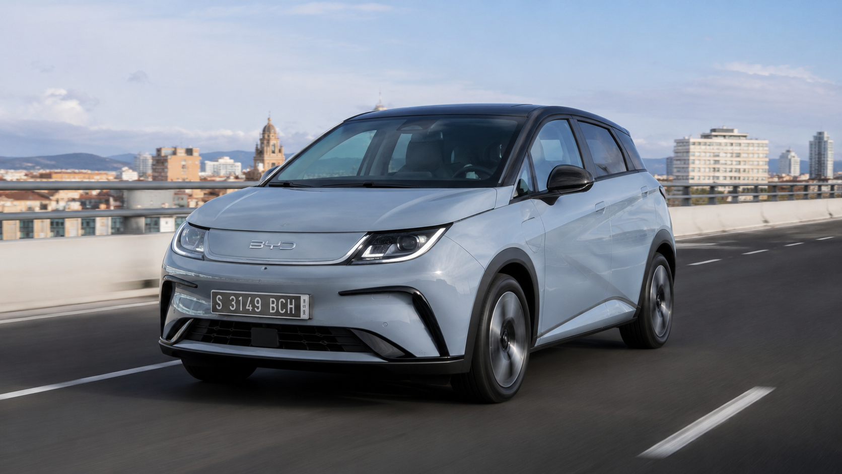 Affordable 2026 electric vehicle driving on a modern road